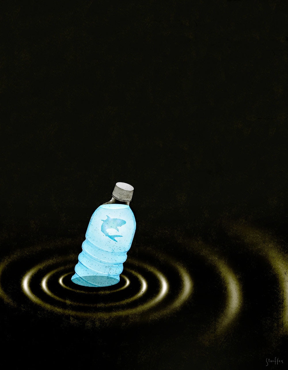 Plastic bottle floating in water